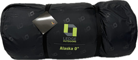 Ledge_Alaska_0_sleeping_bag_packed_in_black_carry_duffle_with_Ledge_Outdoors_logo